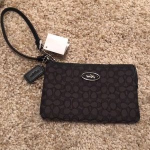 C logo Coach wristlet